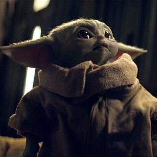 Baby Yoda aus der Serie "The Mandalorian". Das "Star Wars"-Franchise hat einen neuen Kinofilm zu der erfolgreichen Serie angekündigt.