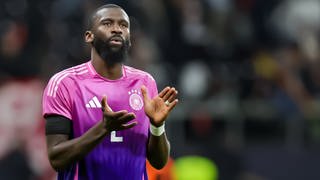 Germany player Antonio Rüdiger thanks the spectators after the final whistle.