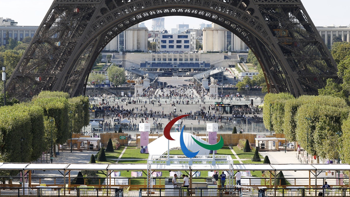 Scene from Paris Paralympics Photo shows the Three Agitos Paralympic Games symbol (front) set up at the Eiffel Tower Stadium in Paris on Aug. 27, 2024, a day before the Games opening ceremony.