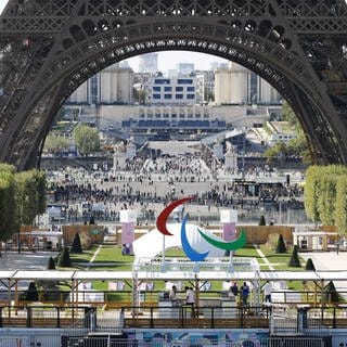 Scene from Paris Paralympics Photo shows the Three Agitos Paralympic Games symbol (front) set up at the Eiffel Tower Stadium in Paris on Aug. 27, 2024, a day before the Games opening ceremony.