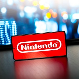 Das Logo der Firma Nintendo auf einem Smartphonebildschirm